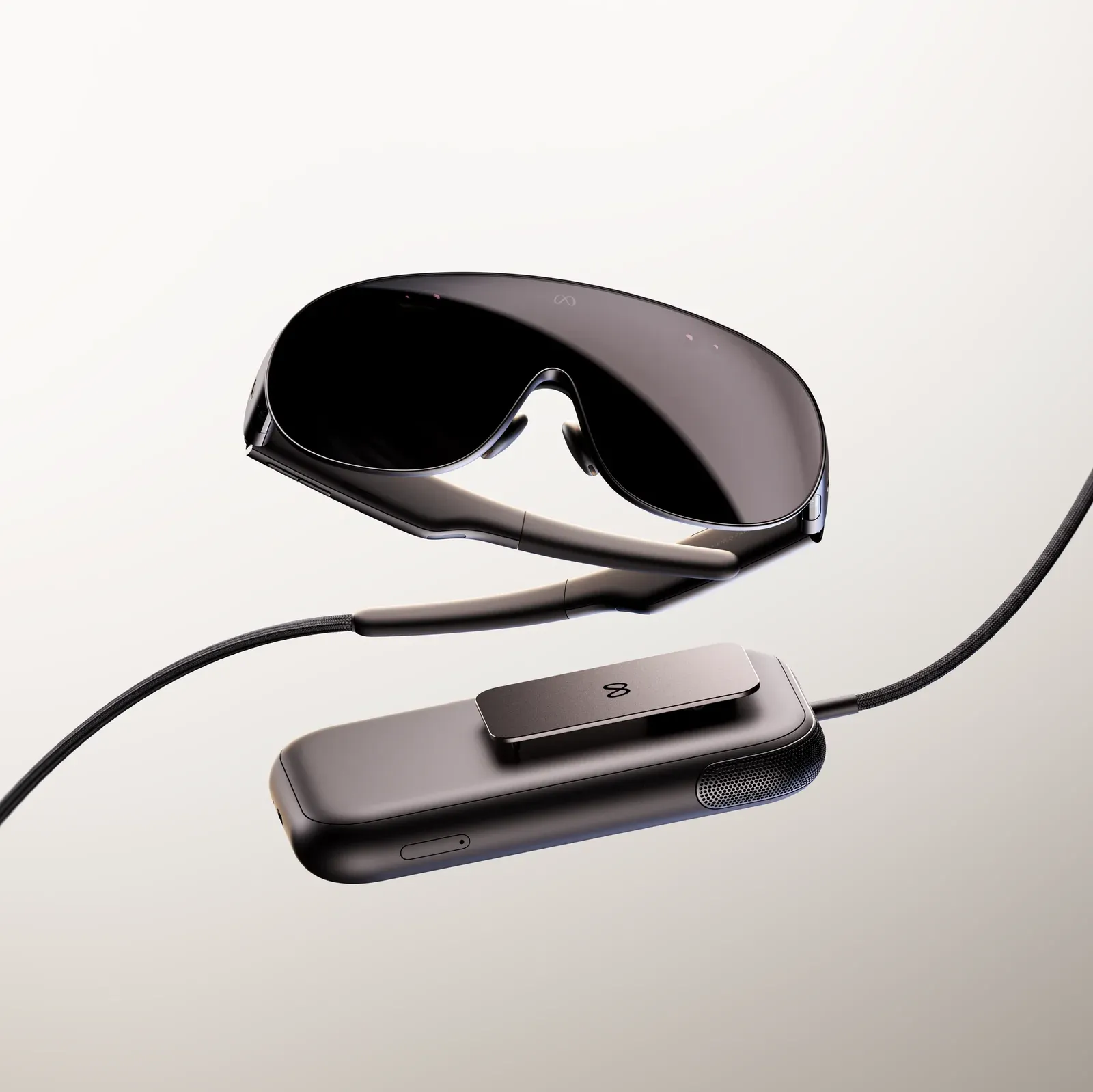 Meta VR Glasses i puck obliczeniowy Snapdragon Reality Elite połączone światłowodem